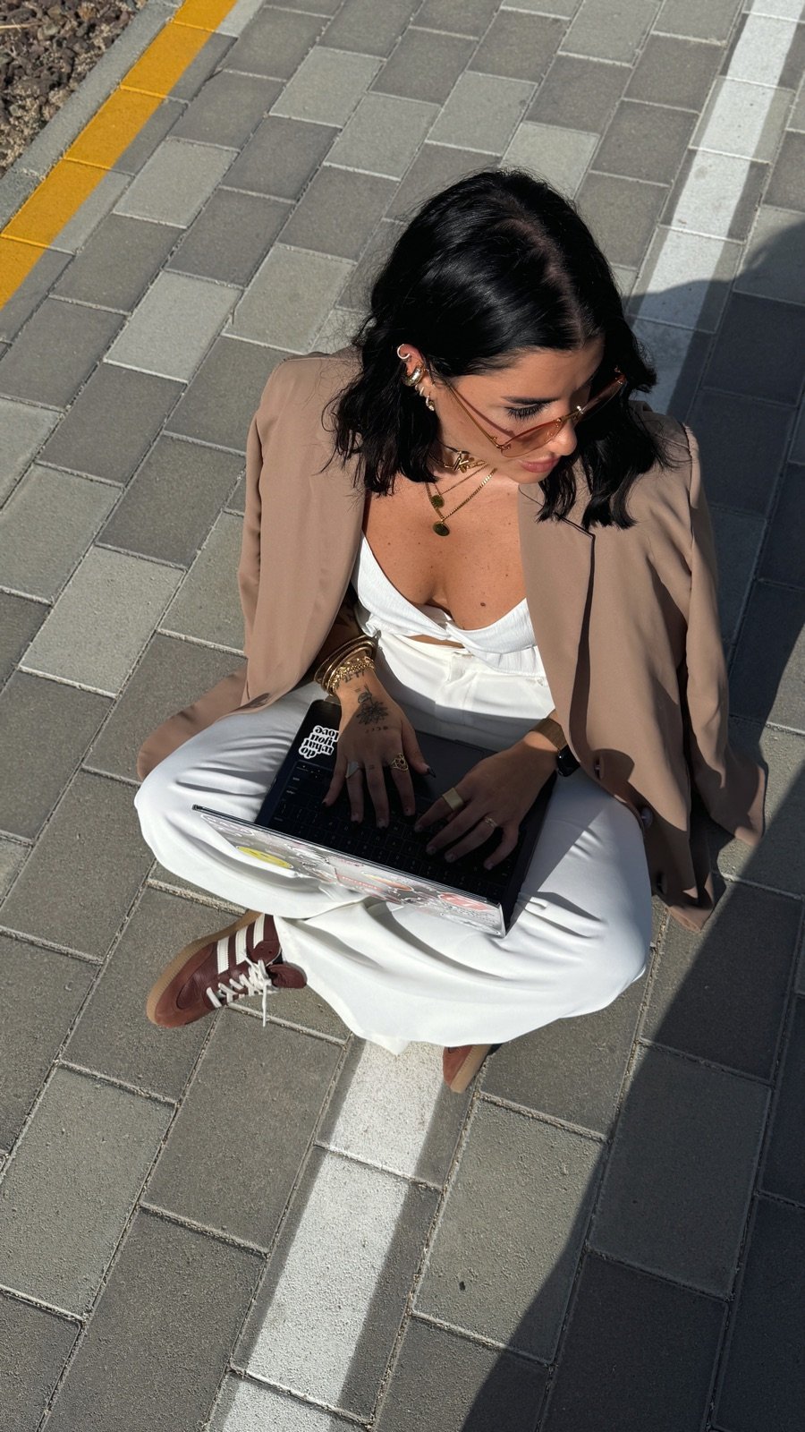 Tania El Badri, founder of Yu Media, working in Dubai